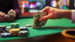 rajacuan69 slot platform interface showing Liga 1 fixtures and live casino tables